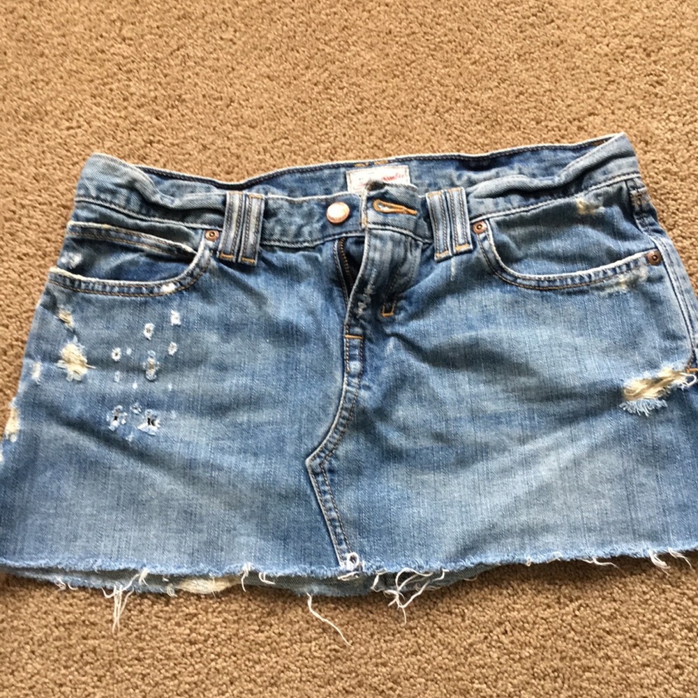 Distressed jean mini skirt